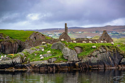 Scenic view of rock formations against sky