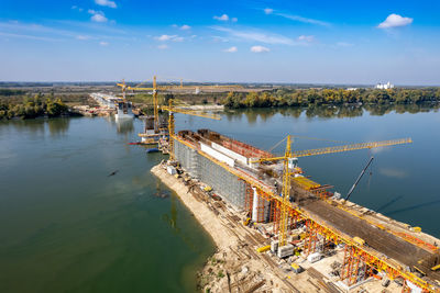 High angle view of pier over river against sky