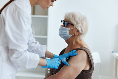 Midsection of woman holding hands