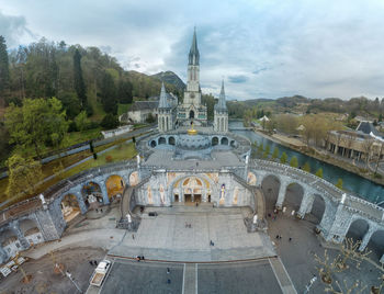 High angle view of cathedral against cloudy sky