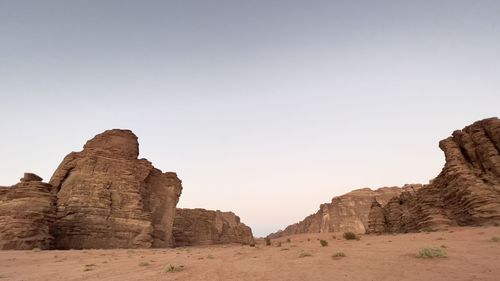 Rock formations against clear sky