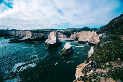 Panoramic view of sea against cloudy sky