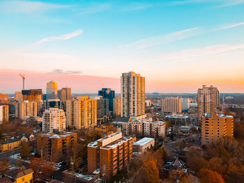 High angle view of buildings against sky during sunset