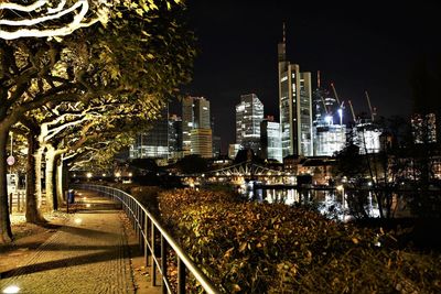 Illuminated buildings in city at night