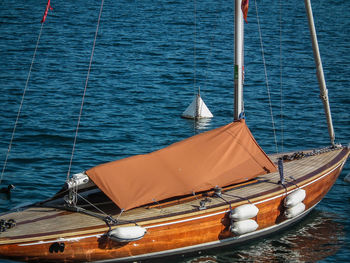 Boats moored on sea