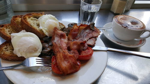 Close-up of breakfast served on table