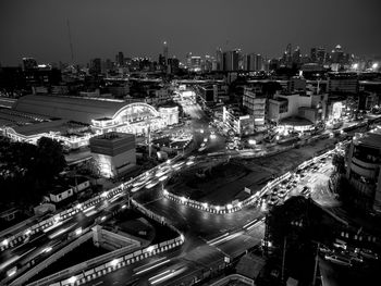 High angle view of illuminated city buildings at night