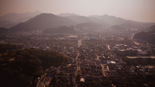 High angle view of town against sky at night