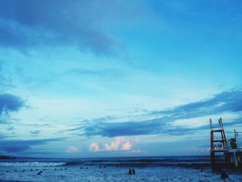 Scenic view of sea against blue sky