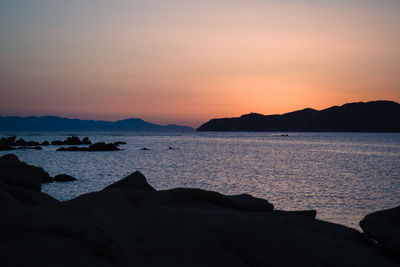 Scenic view of sea against sky during sunset