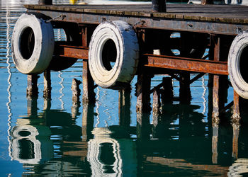 Reflection of metallic structure in puddle