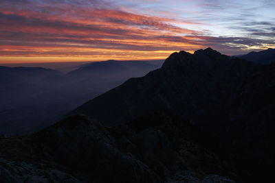 Scenic view of mountains against sky during sunset