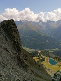 High angle view of land and mountains against sky