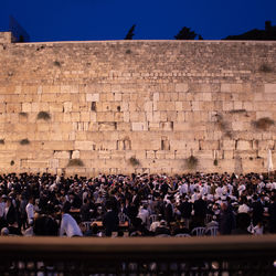 Group of people in front of historical building