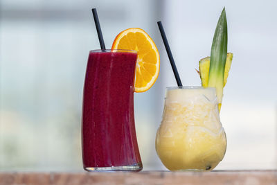 Close-up of drink on glass table