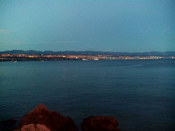 Scenic view of sea against clear blue sky