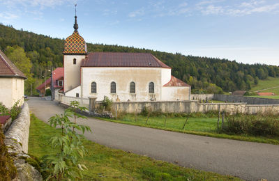 Boujeon church with a comtois bell tower in the doubs department in franche comté