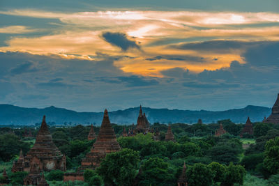 View of temples against cloudy sky