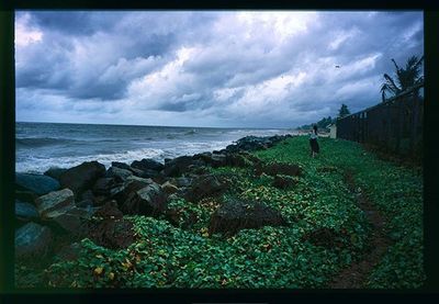 Scenic view of sea against cloudy sky