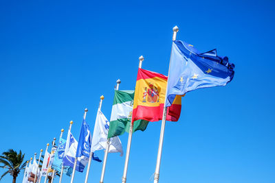  flags of various nations on the mast