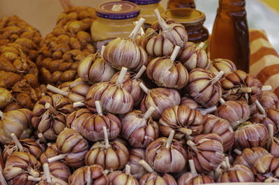 High angle view of onions for sale at market stall