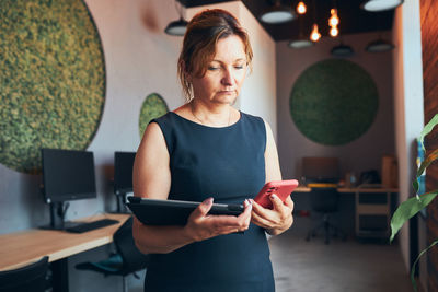 Young woman using mobile phone