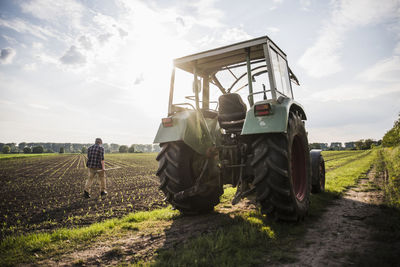 Farmer walking in a field