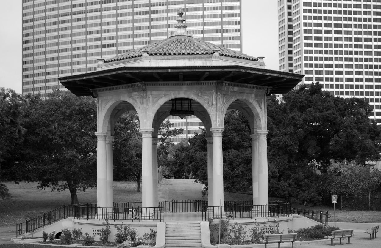 architecture, built structure, building exterior, tree, city, architectural column, travel destinations, tower, outdoors, famous place, entrance, dome, tall - high, day, government building, city life, facade, history, tourism, spire, office building, modern, no people, exterior