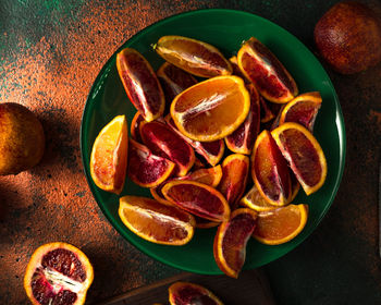 High angle view of fruits in bowl on table