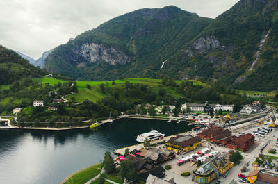 High angle view of river amidst trees and mountains