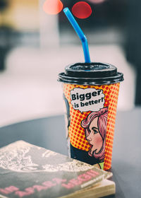 Close-up of coffee cup on table