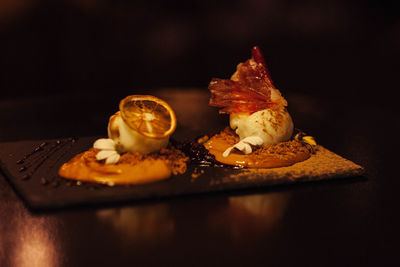 Close-up of dessert served on table