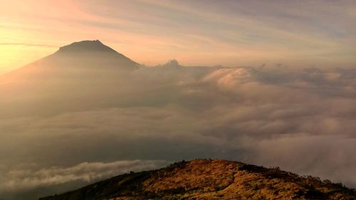 Scenic view of mountains against sky during sunset