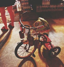 Close-up of bicycle against wall