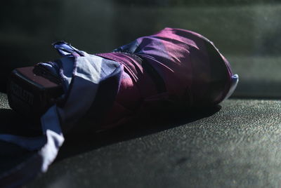 Close-up of man sleeping on floor