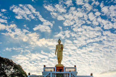 Low angle view of statue against sky