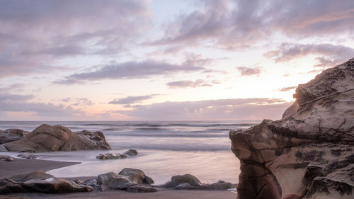 Scenic view of sea against sky during sunset