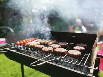 Close-up of meat on barbecue grill