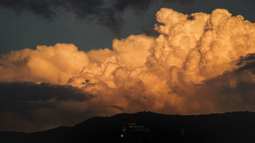 Scenic view of dramatic sky during sunset