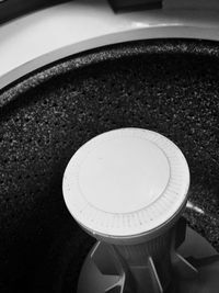 Close-up of circular object on wall