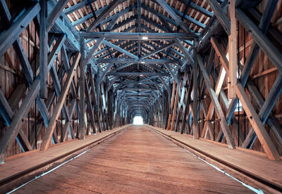 Low angle view of bridge in tunnel