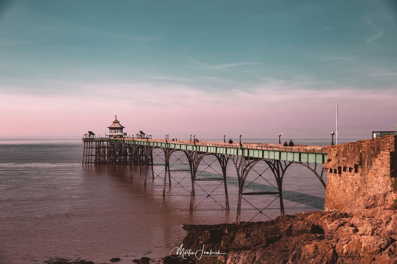 PIER ON SEA DURING SUNSET