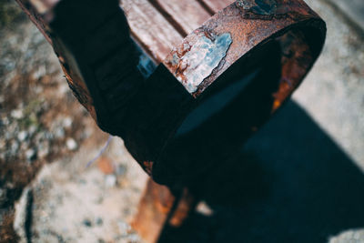 High angle view of person on rusty metal