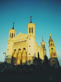 Low angle view of cathedral against blue sky