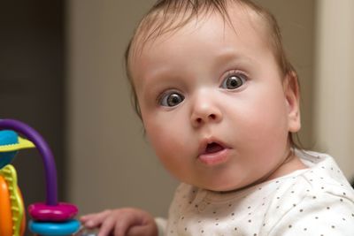 Portrait of cute baby at home