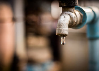 Close-up of water falling from faucet