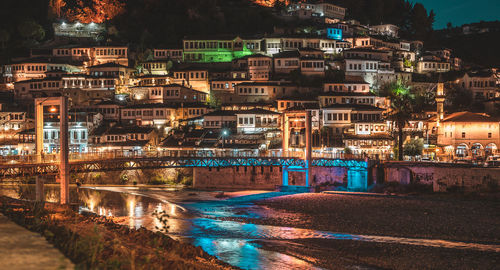 Illuminated buildings in city at night