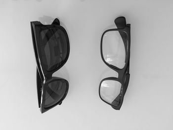 Close-up of eyeglasses over white background