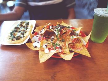 Close-up of served food on table