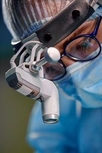 Close-up portrait of man wearing sunglasses